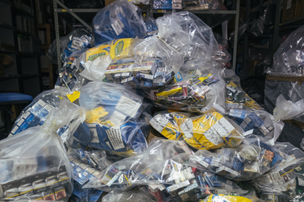 Plastic bags full of seized illegal cigarettes