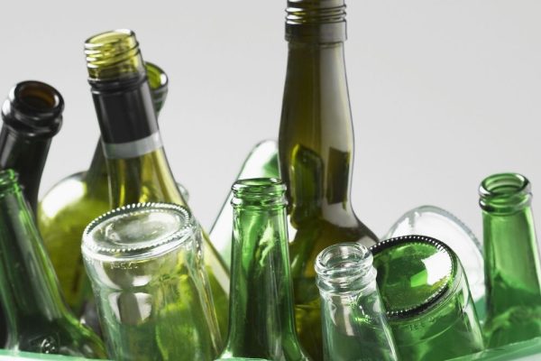 empty glass bottles in trash